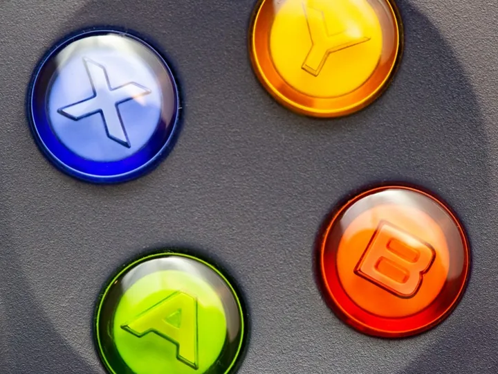 Coloured action buttons of a game controller